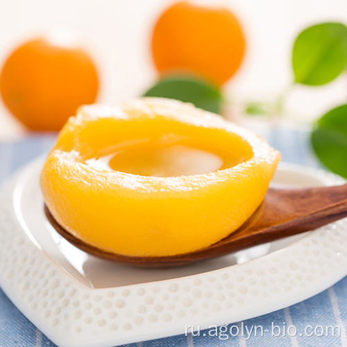 Фабрика продает желтые персиковые фрукты консервированные